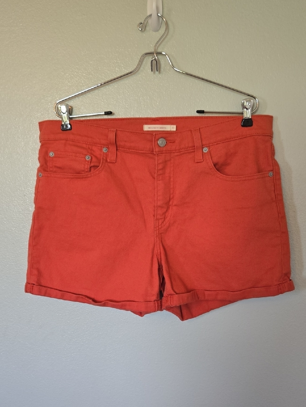 Levi's | Orange Cuffed 4" Denim Shorts Size 33